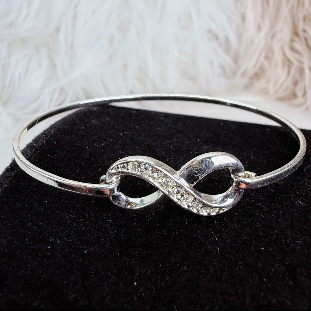 Silvertone bling accent Infinity Bracelet - Picture 8 of 11